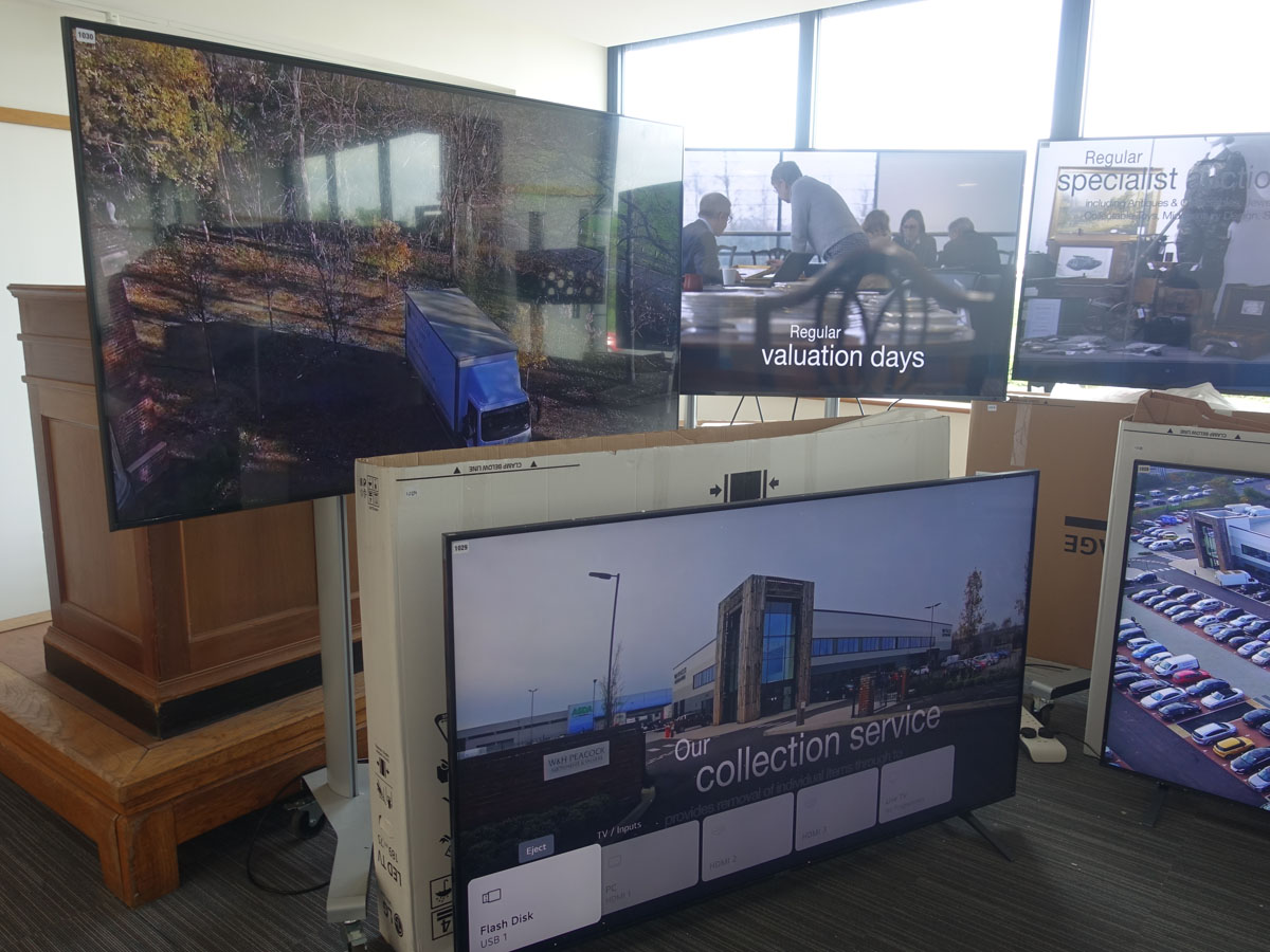 Large LG Professional Digital Signage Display monitors, TVs & trolley Stands