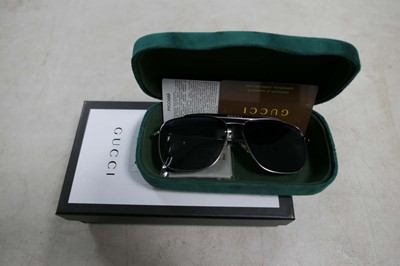 Lot 2064 - Gucci sunglasses with hard case and box