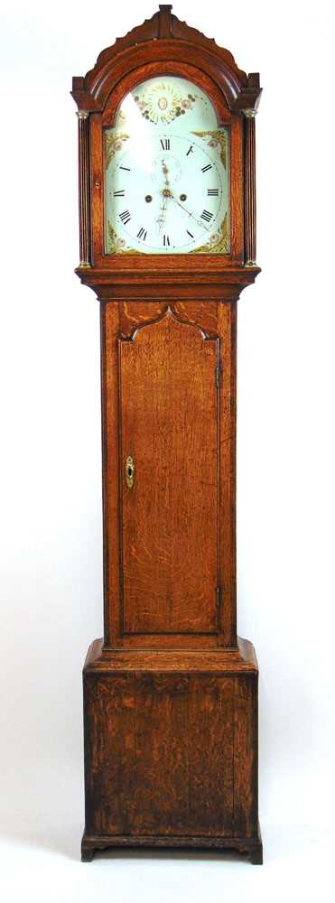 Lot 100 - An 18th century oak longcase clock, the