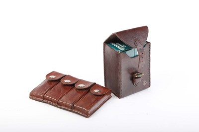 Lot 24 - Set of four leather belt pouches with Mauser...