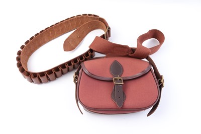 Lot 1025 - 12 bore leather cartridge belt and canvas...