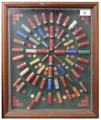 Lot 9 - (S2) A framed and glazed cartridge display...