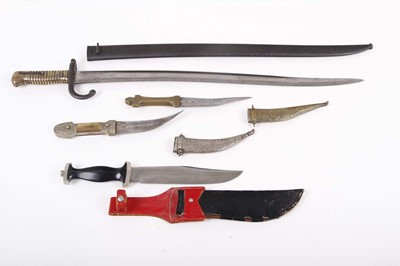 Lot 68 - A group of edged weapons to include French...
