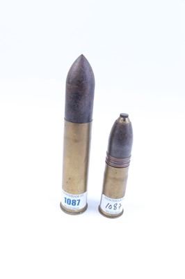 Lot 1087 - Two inert shells