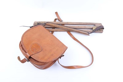 Lot 1034 - Tan leather cartridge bag, together with a hip...