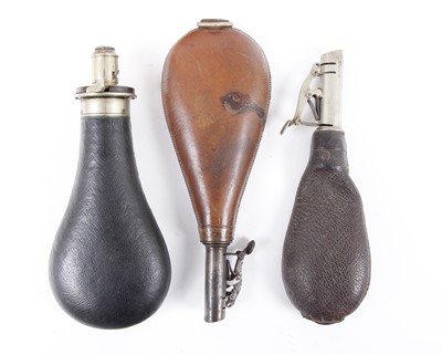 Lot 2 - A leather covered powder flask by G & J. W....
