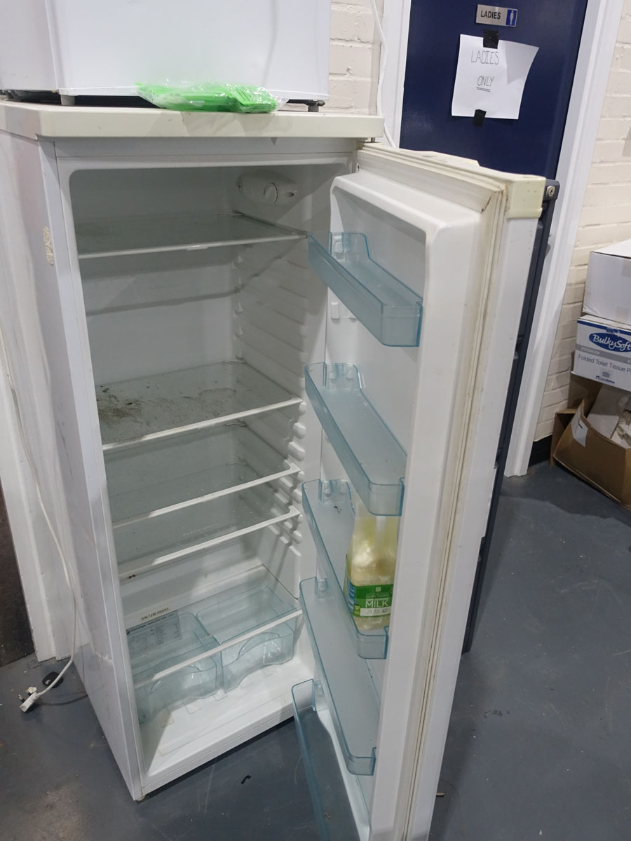 Lot 161 Upright refrigerator and Russell Hobbs table