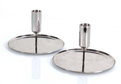 Lot 90 - A pair of Georg Jensen 'Tunes' candle holders (2)