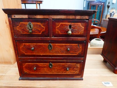Lot 35 - An apprentice chest of two short over three...