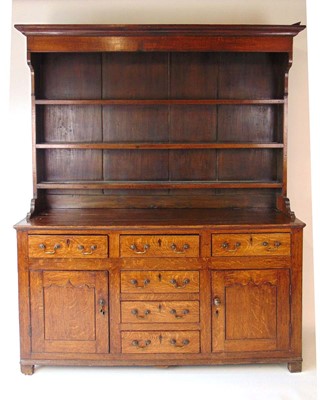 Lot 1 - A George III oak Welsh dresser, with cavetto...