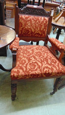 Lot 3 - A Victorian upholstered armchair with carved...