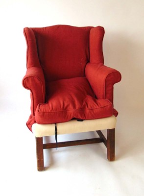 Lot 7 - A 19th century George III style wing armchair,...