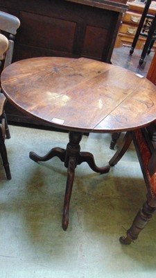 Lot 11 - A George III oak tilt top occasional table,...