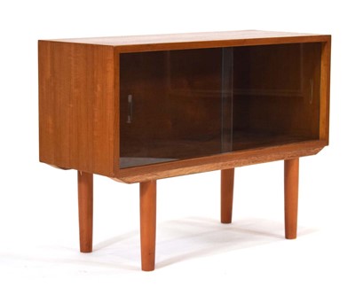 Lot 43 - A 1960/70's teak cabinet with two glazed...