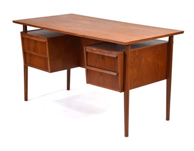 Lot 92 - A 1960's Danish teak and crossbanded desk, the...