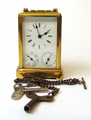 Lot 76 - A French brass cased calendar carriage clock...