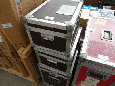 Lot 83 - A set of 3 brown padded flight cases