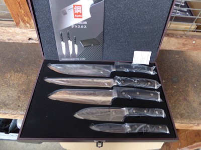 Lot 21 - Damascus style 5 piece knife set in case