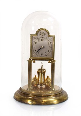Lot 90 - An anniversary clock, the silvered dial...