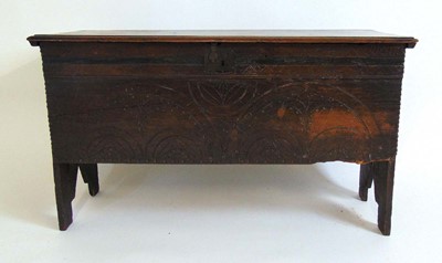 Lot 35 - A 17th century oak coffer, the top with...
