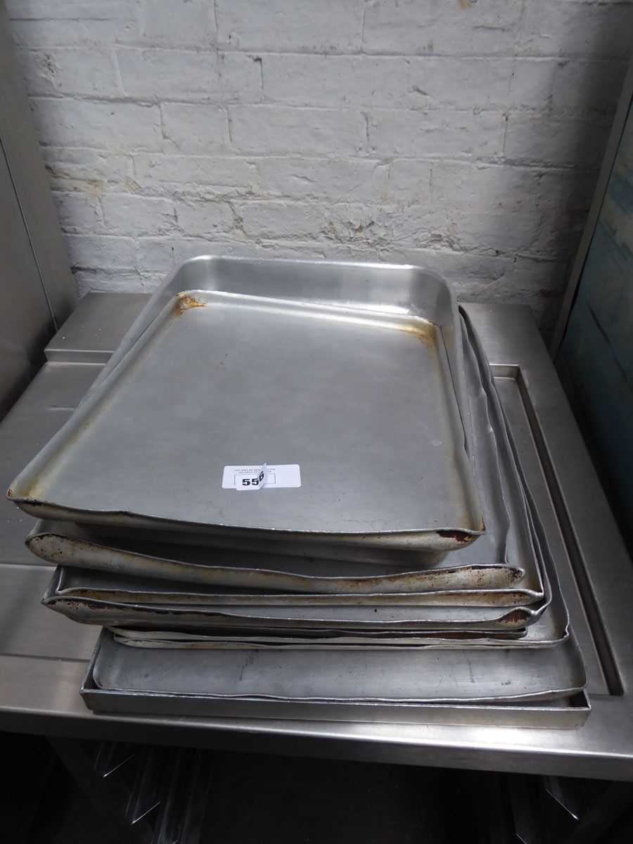 Lot 556 Stack of aluminium oven trays
