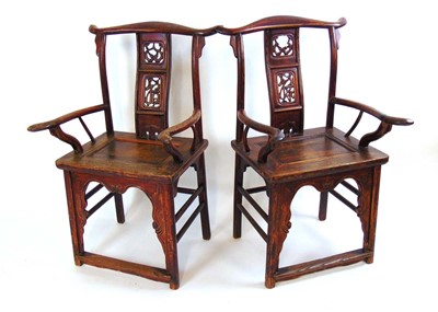 Lot 43 - A pair of Chinese elm official hat armchairs,...