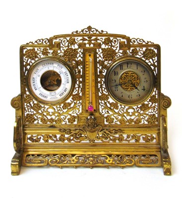 Lot 80 - A brass combination clock, barometer &...