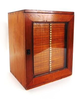 Lot 59 - A Victorian collectors cabinet, the stained...