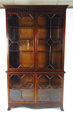 Lot 63 - An Edwardian mahogany astragal glazed display...