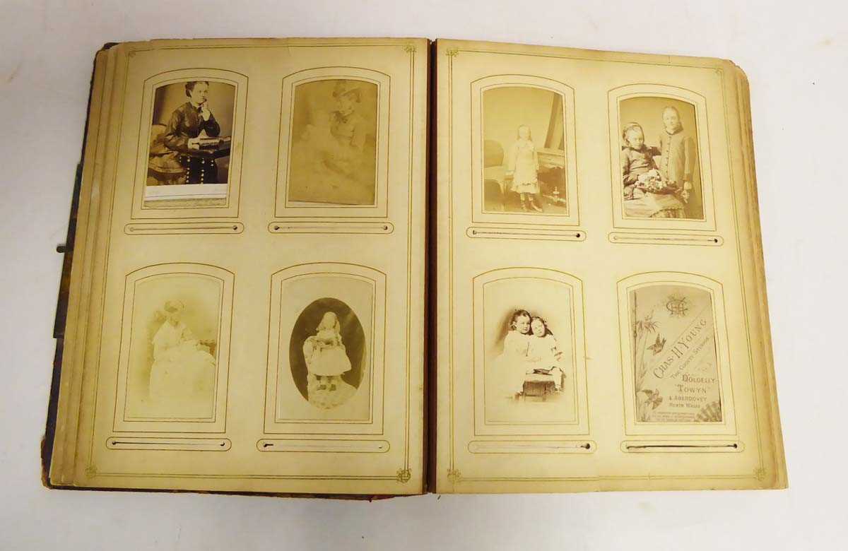 Lot 227 - Leatherbound photo album containing Victorian...