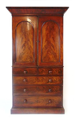 Lot 2 - A 19th century mahogany linen press, with arch...