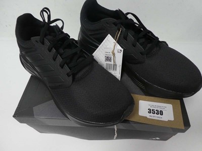 Lot Boxed pair of Adidas Galaxy trainers, black,...