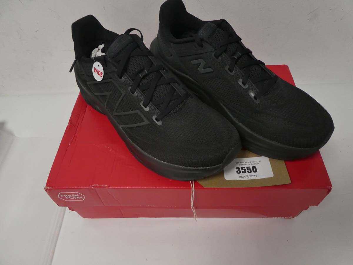 Lot 3550 - Boxed pair of New Balance trainers, black, UK 10