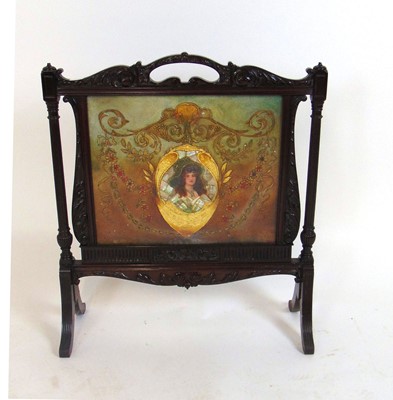 Lot 15 - A Victorian carved mahogany fire screen in the...