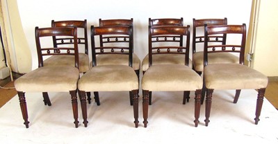 Lot 4 - A set of eight flame mahogany Regency style...