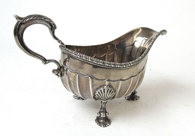 Lot 402 - A George III silver sauce boat of large...