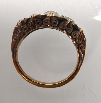 Lot A yellow metal ring set five graduated old cut...