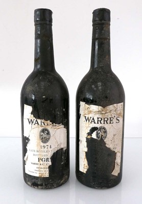 Lot 303 - 2 bottles of Warre's 1974 Vintage Port (ullage...