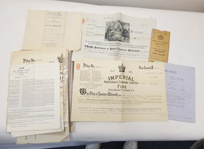 Lot 216 - A collection of insurance policy documents...