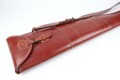 Lot 1031 - A Wildfowler's stout leather fleece-line gun...