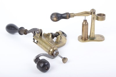 Lot 22 - Brass 12 bore roll turnover machine and brass...