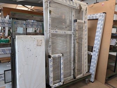 Lot 105 - 6 white UPVC window frames with associated...
