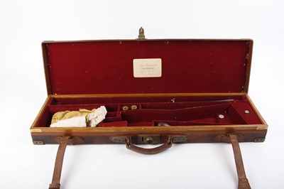 Lot 30 - Oak and leather gun case with brass corners,...