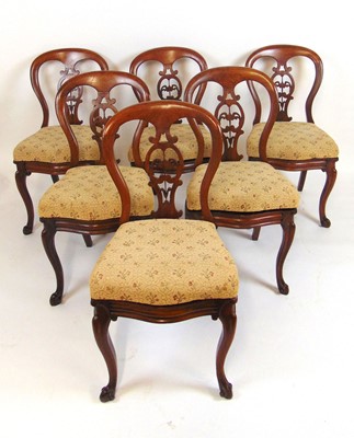 Lot 31 - A set of six Victorian mahogany balloon back...