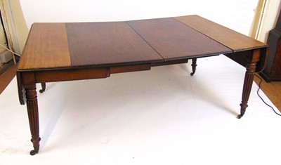 Lot 32 - A Victorian mahogany dining table, with two...