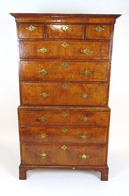 Lot 33 - An 18th century walnut and feather banded...