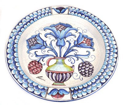 Lot 60 - An Italian pottery charger, the crackle glaze...