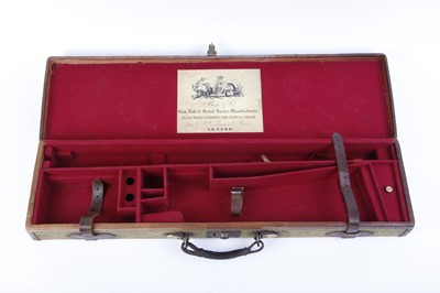 Lot 33 - Canvas and leather gun case with remnant...