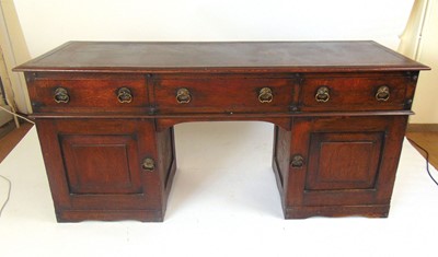 Lot 38 - A 19th century oak writing table or sideboard,...