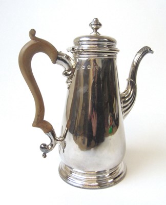 Lot 400 - A George II silver hot water jug, London 1739,...